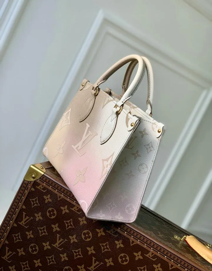 Louis Vuitton 1:1 Mirror Replica Ivory OnTheGo PM Monogram Empreinte Louis Vuitton Replica Onthego Louis Vuitton 1:1 Mirror Replica Ivory OnTheGo PM Monogram Empreinte Louis Vuitton Replica Onthego