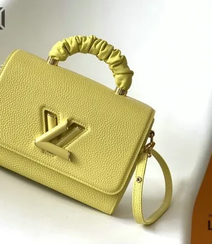 Louis Vuitton 1:1 Mirror Replica Taurillon Smooth Calfskin Scrunchie Twist One Handle 23CM/9.1IN Louis Vuitton Replica Twist