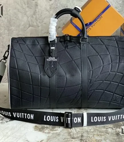 Louis Vuitton 1:1 Mirror Replica Keepall Bandouliere 50 FIFA World Cup Embossed Taurillon 50CM/19.7IN Louis Vuitton Replica Keepall
