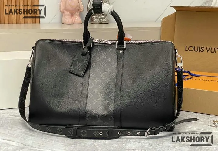 Louis Vuitton 1:1 Mirror Replica Taiga Eclipse Keepall Bandouliere 50 Black 50CM/19.7IN Louis Vuitton Replica Keepall Louis Vuitton 1:1 Mirror Replica Taiga Eclipse Keepall Bandouliere 50 Black 50CM/19.7IN Louis Vuitton Replica Keepall