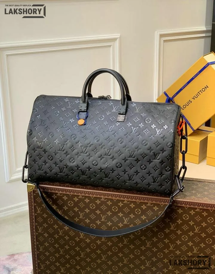 Louis Vuitton 1:1 Mirror Replica X Virgil Abloh Keepall Bandouliere 50 w/ Orange Chain 50CM/19.7IN Louis Vuitton Replica Keepall Louis Vuitton 1:1 Mirror Replica X Virgil Abloh Keepall Bandouliere 50 w/ Orange Chain 50CM/19.7IN Louis Vuitton Replica Keepall