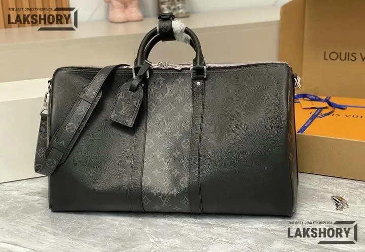 Louis Vuitton 1:1 Mirror Replica Taiga Eclipse Keepall Bandouliere 50 Black 50CM/19.7IN Louis Vuitton Replica Keepall Louis Vuitton 1:1 Mirror Replica Taiga Eclipse Keepall Bandouliere 50 Black 50CM/19.7IN Louis Vuitton Replica Keepall