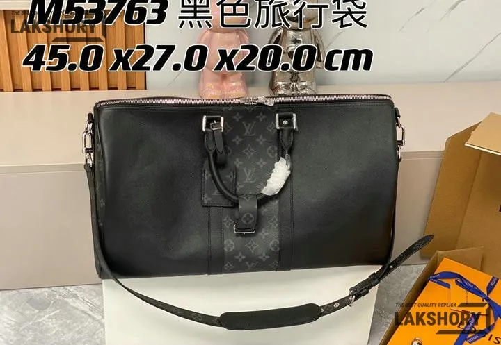 Louis Vuitton 1:1 Mirror Replica Taiga Eclipse Keepall Bandouliere 50 Black 50CM/19.7IN Louis Vuitton Replica Keepall Louis Vuitton 1:1 Mirror Replica Taiga Eclipse Keepall Bandouliere 50 Black 50CM/19.7IN Louis Vuitton Replica Keepall
