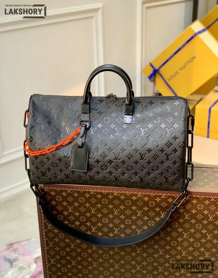 Louis Vuitton 1:1 Mirror Replica X Virgil Abloh Keepall Bandouliere 50 w/ Orange Chain 50CM/19.7IN Louis Vuitton Replica Keepall Louis Vuitton 1:1 Mirror Replica X Virgil Abloh Keepall Bandouliere 50 w/ Orange Chain 50CM/19.7IN Louis Vuitton Replica Keepall
