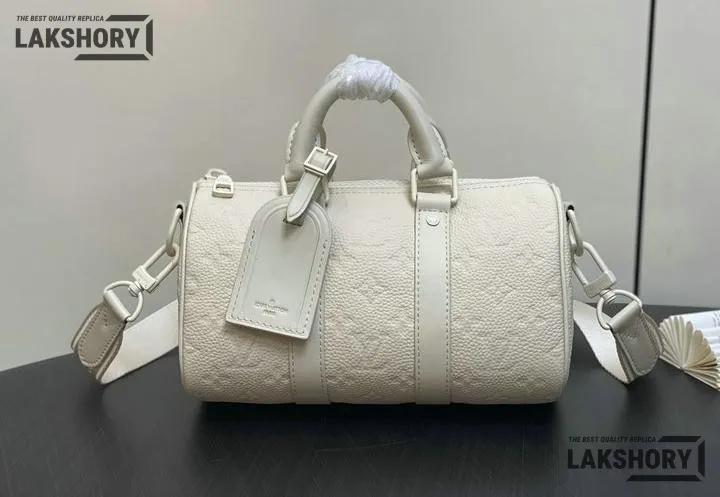 Louis Vuitton 1:1 Mirror Replica Keepall Bandoulire 25 Taurillon Monogram Ceam 25CM/9.8IN Louis Vuitton Replica Keepall Louis Vuitton 1:1 Mirror Replica Keepall Bandoulire 25 Taurillon Monogram Ceam 25CM/9.8IN Louis Vuitton Replica Keepall