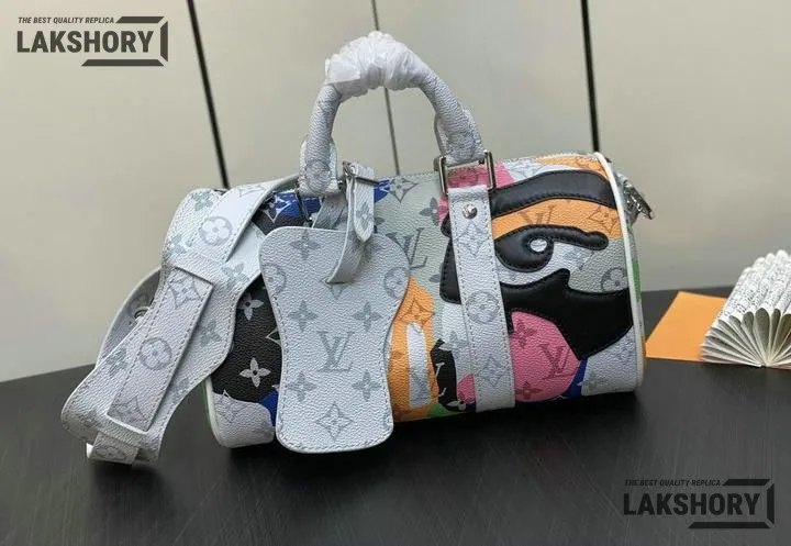 Louis Vuitton 1:1 Mirror Replica Keepall Bandoulire 25 Monogram Eclipse Multicolor 25CM/9.8IN Louis Vuitton Replica Keepall Louis Vuitton 1:1 Mirror Replica Keepall Bandoulire 25 Monogram Eclipse Multicolor 25CM/9.8IN Louis Vuitton Replica Keepall