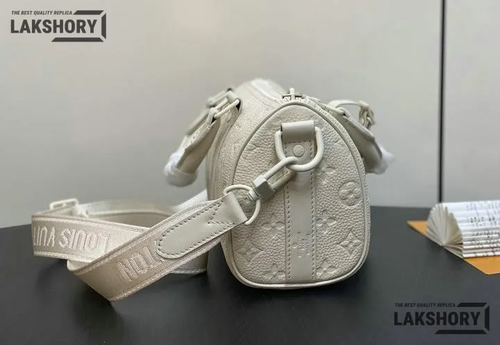 Louis Vuitton 1:1 Mirror Replica Keepall Bandoulire 25 Taurillon Monogram Ceam 25CM/9.8IN Louis Vuitton Replica Keepall Louis Vuitton 1:1 Mirror Replica Keepall Bandoulire 25 Taurillon Monogram Ceam 25CM/9.8IN Louis Vuitton Replica Keepall